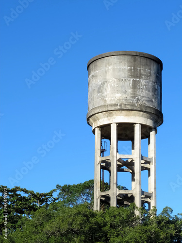 Old water tank with blue sky