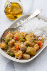 squid stew with boiled rice on dish