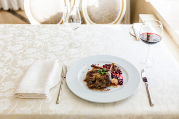 Duck leg confit with mountain cranberries sauce and pear chutney