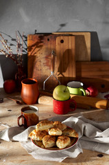 Russian meat piroshki. Traditional hand mini pies on wooden background