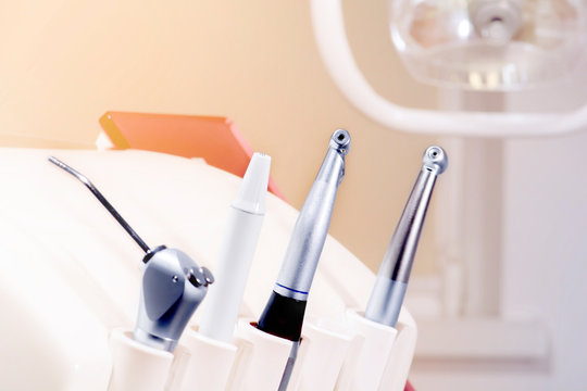 Dental Unit with dental instruments: scaler, turbine and micromotor.