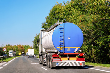 Blue Tanker storage truck on asphalt highway Poland