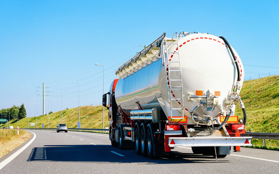 White Tanker storage truck on asphalt highway in Poland