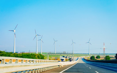 Wind mills at highway road in South Moravia