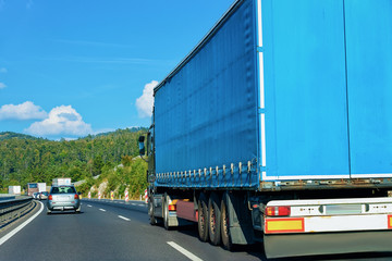 Blue Truck in asphalt road of Poland