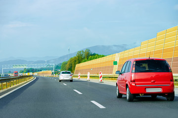 Red Car on highway road in Slovenia