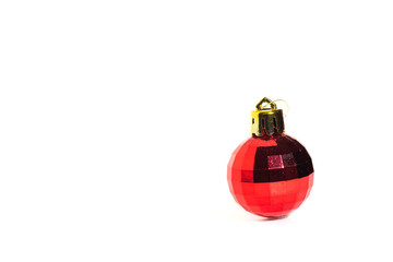 Red christmas ball, white background