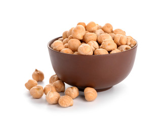 Bowl with chickpeas on white background