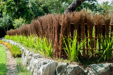Obraz premium Fence decorated with trees, Japanese fences house