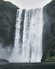 Woman near waterfall in Iceland