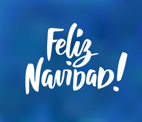 Feliz Navidad - spanish Merry Christmas text. Hand drawn holiday greetings quote on blue background.