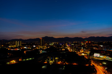Fototapeta na wymiar Aerial View of Ipoh CIty,Malaysia during sunset. soft focus,blur due to long exposure. visible noise due to high ISO.