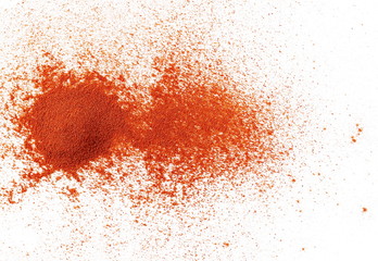 Pile of red pepper, paprika powder isolated on white background