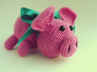 Pink pig toy crocheted with his hands