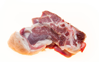 Lamb slices closeup. Australian lamb . Part of the carcass of a sheep saddle on the bone. Fresh meat with streaks of fat.