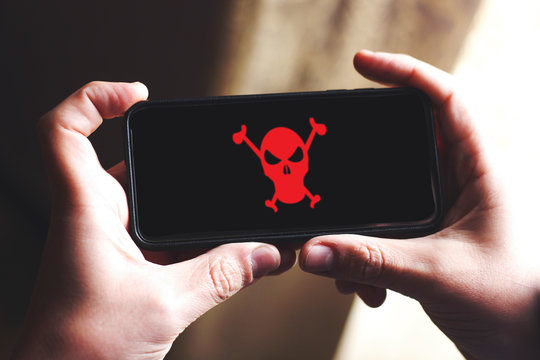 Red Pirate Skull On Smartphone Screen