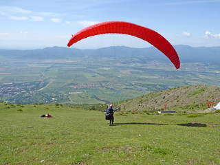 Paraglider launching at Sopot, Bulgaria