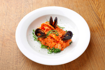 risotto with shrimps and mussels, seafood platter with mussels and shrimps.