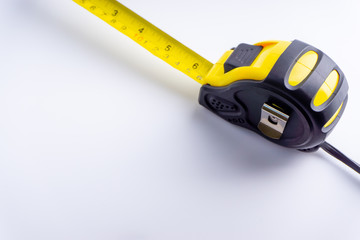 Measure Tape isolated on white background with selective focus and crop fragment