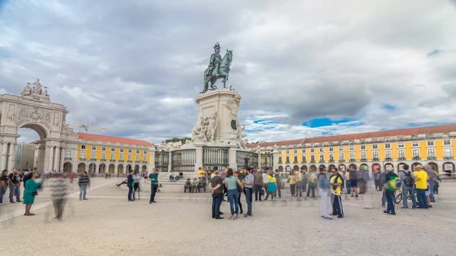 Bronze statue of King Jose I and triumphal arch at Rua Augusta at Commerce square timelapse hyperlapse in Lisbon, Portugal.