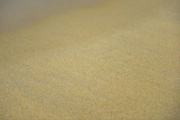 Sand beach texture background, selective focus