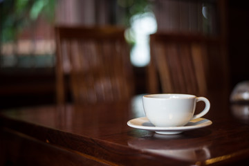 Coffee cup on blur background.