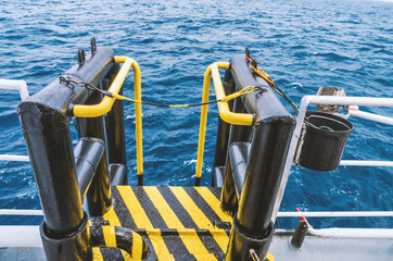 View of offshore vessel boatlanding - installation for crew change. Safe work at sea