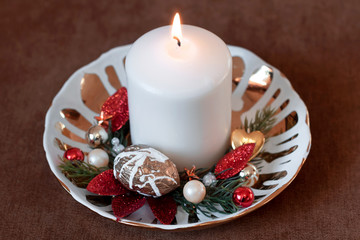 Christmas composition of candles. New Year card.