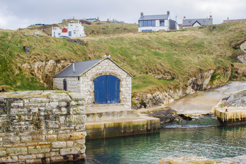 The small harbor at Ballintoy in County Antrim Northern Ireland