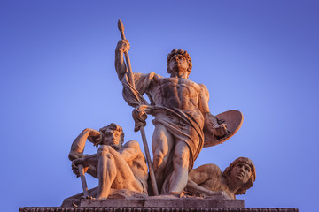 Fototapeta premium Statues over the marbles of the Altare della Patria (Altar of the Nation) or Vittoriano, Rome, Italy
