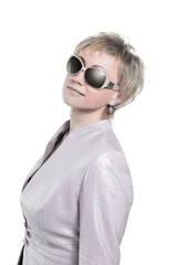 portrait of a beautiful woman in a white suit and dark glasses