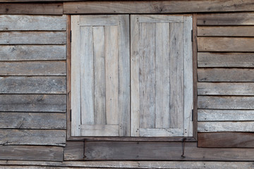 Old wooden window with wooden wall