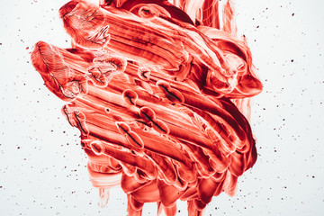 Obraz na płótnie Canvas top view of blood smeared with hand on white