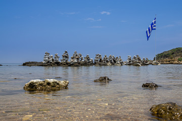 Stone pyramids in the bay by Faliraki, Rhodes Greece