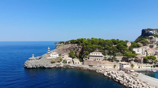 Flight over the bay of Port de Soller in Mallorca Tramuntana Mountains