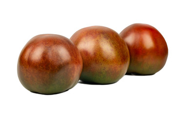 Three kumato tomatoes