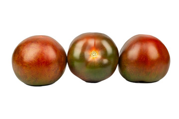 Three kumato tomatoes