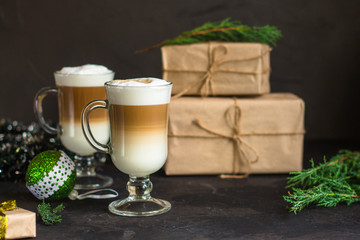 Latte - coffee with milk in a transparent cup on the table. Top view.