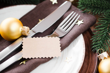 Christmas table place setting in vintage or rustic style.