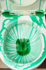 Obraz premium cleaning closestool with chemical liquid