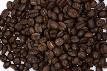 Coffee beans background closeup texture.