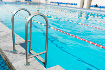 Swimming pool handrails.