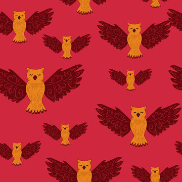 Seamless pattern with owls in doodle style on red. Hand drawn vector background of cute birds. Design for prints and T-shirts,wrapping paper wallpaper