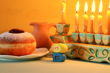image of jewish holiday Hanukkah background with menorah (traditional candelabra).