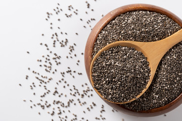 Close up of Chia seeds on wooden spoon