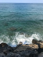 waves crashing on rocks