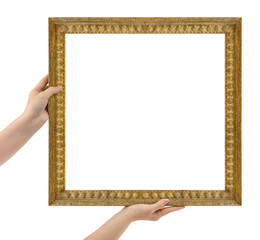 Wooden picture frame in hands