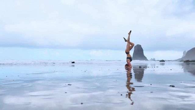 Headstand at the beach