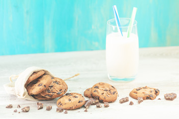 Christmas and New Year composition with delicious chocolate cookies and glass of milk
