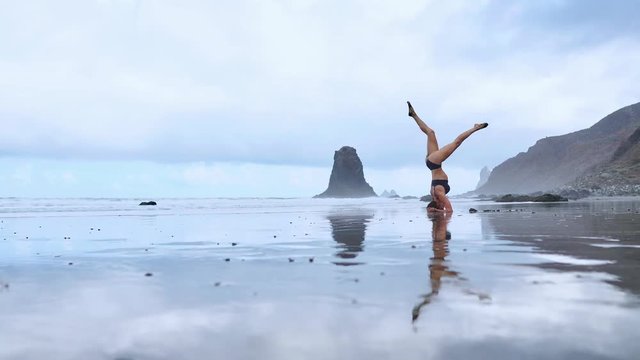 Headstand at the beach
